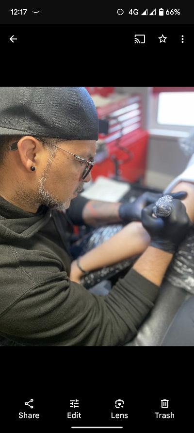 Tattoo artist at work